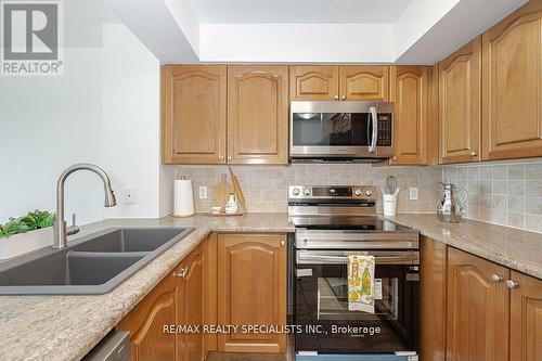 1615 - 335 Rathburn Road W, Mississauga, ON - Indoor Photo Showing Kitchen With Double Sink