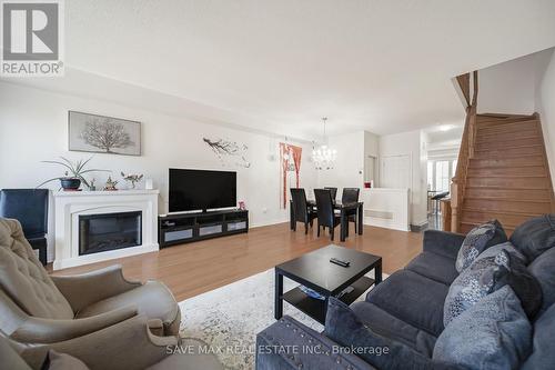 11 Cedar Lake Crescent, Brampton, ON - Indoor Photo Showing Living Room With Fireplace