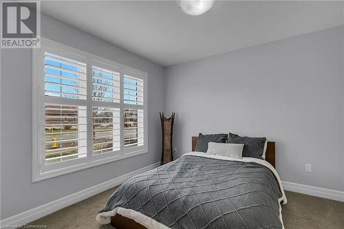 View of carpeted bedroom - 46 Halliday Drive Drive, Tavistock, ON - Indoor Photo Showing Bedroom