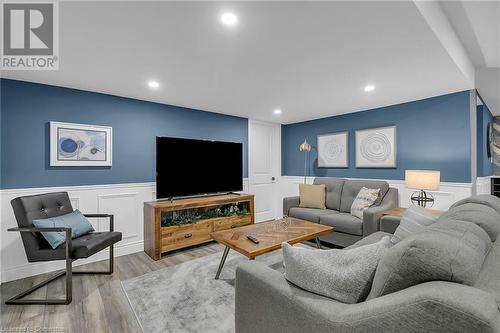 Living room featuring light wood-type flooring - 46 Halliday Drive Drive, Tavistock, ON - Indoor Photo Showing Living Room