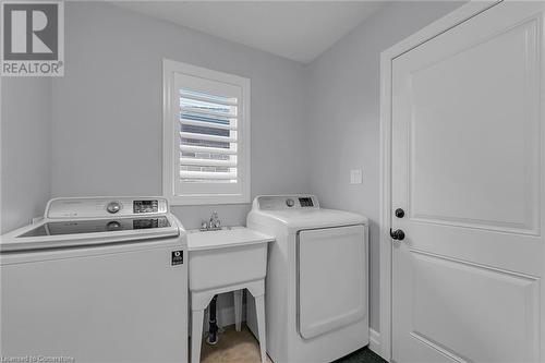 Washroom featuring washing machine and clothes dryer - 46 Halliday Drive Drive, Tavistock, ON - Indoor Photo Showing Laundry Room