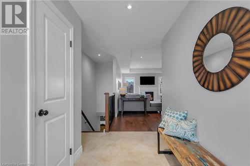 Hallway featuring wood-type flooring - 46 Halliday Drive Drive, Tavistock, ON - Indoor Photo Showing Other Room