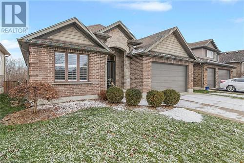 View of front of home featuring a garage - 46 Halliday Drive Drive, Tavistock, ON - Outdoor With Facade