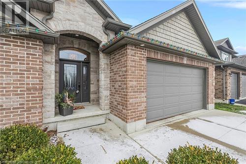 Doorway to property with a garage - 46 Halliday Drive Drive, Tavistock, ON - Outdoor