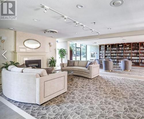 2905 - 65 Skymark Drive, Toronto, ON - Indoor Photo Showing Living Room With Fireplace