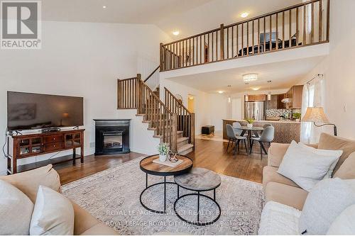 205 Eden Oak Trail, Kitchener, ON - Indoor Photo Showing Living Room With Fireplace