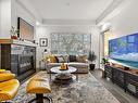 309-9861 Third St, Sidney, BC  - Indoor Photo Showing Living Room With Fireplace 