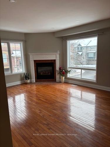 65-5335 Glen Erin Dr, Mississauga, ON - Indoor Photo Showing Living Room With Fireplace