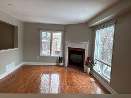 65-5335 Glen Erin Dr, Mississauga, ON - Indoor Photo Showing Living Room With Fireplace