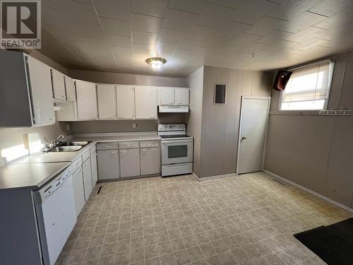 5231 44 Street, Fort Nelson, BC - Indoor Photo Showing Kitchen With Double Sink