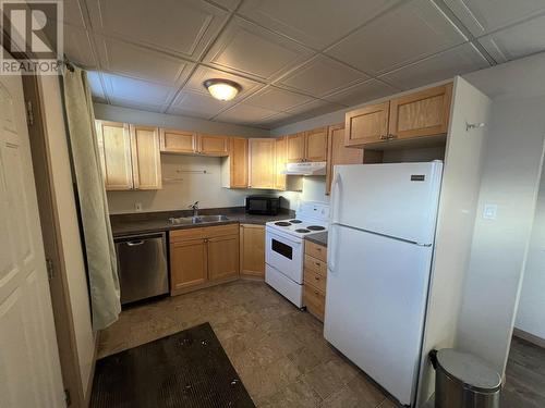 5231 44 Street, Fort Nelson, BC - Indoor Photo Showing Kitchen With Double Sink