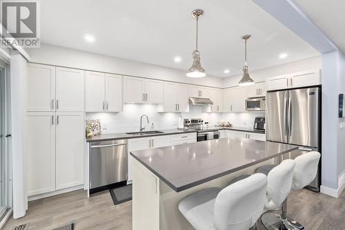 9 1260 Riverside Drive, Port Coquitlam, BC - Indoor Photo Showing Kitchen With Double Sink With Upgraded Kitchen