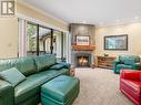 2 4510 Blackcomb Way, Whistler, BC  - Indoor Photo Showing Living Room With Fireplace 