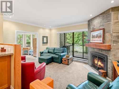 2 4510 Blackcomb Way, Whistler, BC - Indoor Photo Showing Living Room With Fireplace