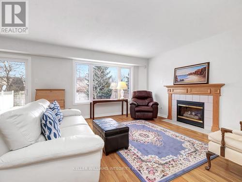 19 Armagh Way, Ottawa, ON - Indoor Photo Showing Living Room With Fireplace