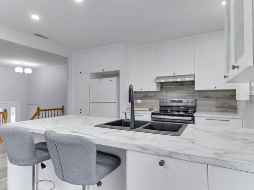 Kitchen - 8225 Rue Agathe, Laval (Saint-François), QC - Indoor Photo Showing Kitchen With Double Sink With Upgraded Kitchen