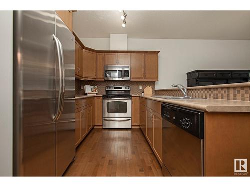 #127 89 Rue Monette, Beaumont, AB - Indoor Photo Showing Kitchen