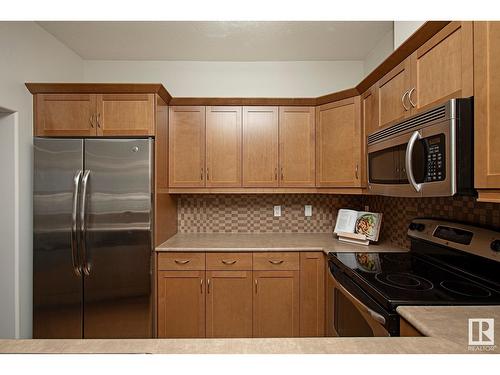 #127 89 Rue Monette, Beaumont, AB - Indoor Photo Showing Kitchen