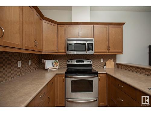 #127 89 Rue Monette, Beaumont, AB - Indoor Photo Showing Kitchen