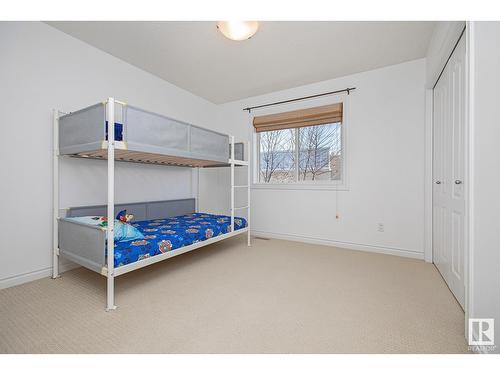 #127 89 Rue Monette, Beaumont, AB - Indoor Photo Showing Bedroom