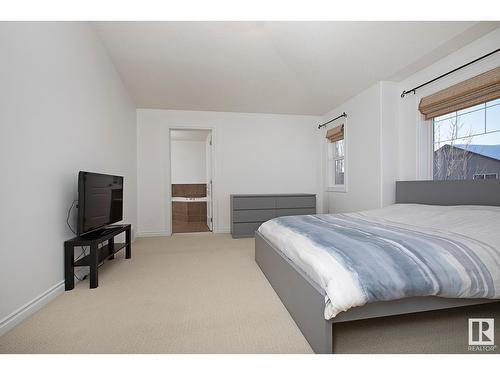 #127 89 Rue Monette, Beaumont, AB - Indoor Photo Showing Bedroom