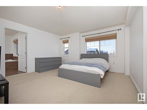 #127 89 Rue Monette, Beaumont, AB - Indoor Photo Showing Bedroom