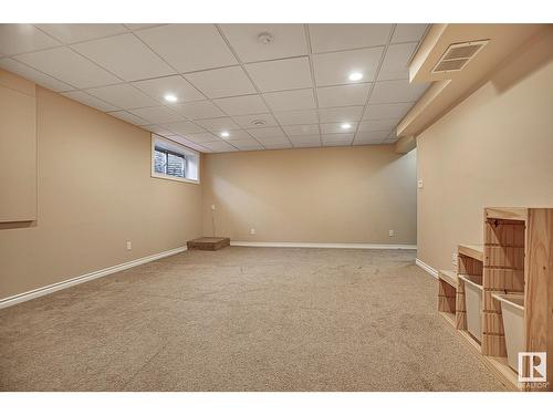 #127 89 Rue Monette, Beaumont, AB - Indoor Photo Showing Basement