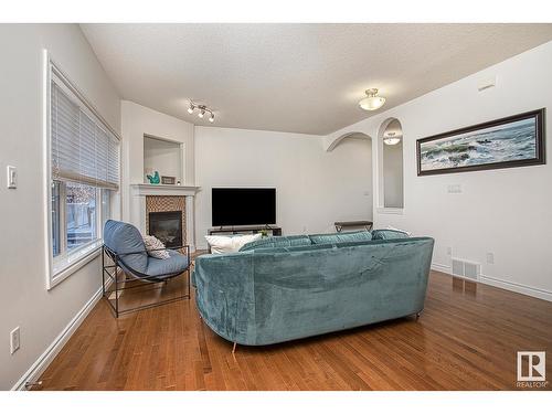 #127 89 Rue Monette, Beaumont, AB - Indoor With Fireplace