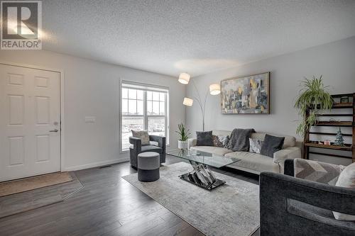 48 Auburn Meadows Boulevard Se, Calgary, AB - Indoor Photo Showing Living Room