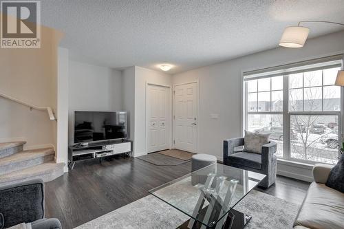 48 Auburn Meadows Boulevard Se, Calgary, AB - Indoor Photo Showing Living Room