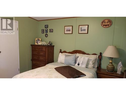 6064 Norman Road, 100 Mile House, BC - Indoor Photo Showing Bedroom