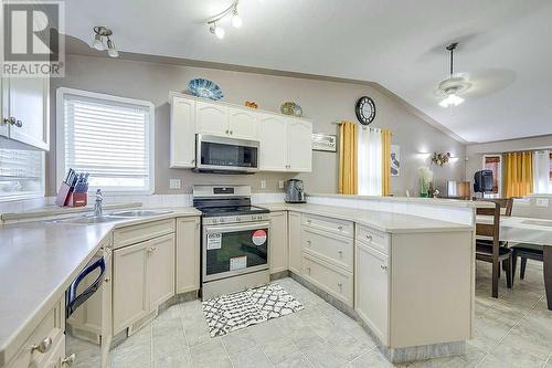 127 Kirkland Close, Red Deer, AB - Indoor Photo Showing Kitchen With Double Sink