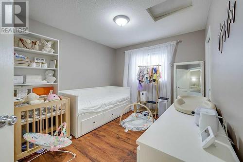 127 Kirkland Close, Red Deer, AB - Indoor Photo Showing Bedroom