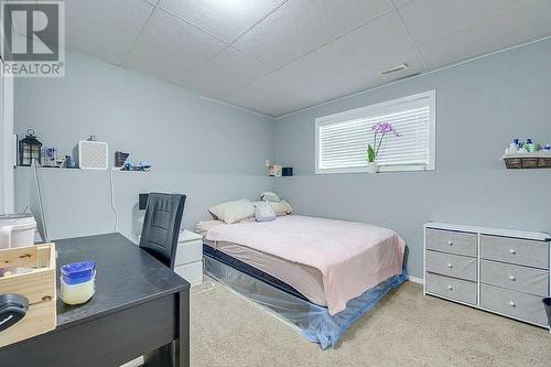 127 Kirkland Close, Red Deer, AB - Indoor Photo Showing Bedroom