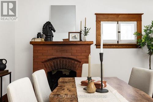 57 Mcmurray Street, Bracebridge, ON - Indoor Photo Showing Dining Room With Fireplace