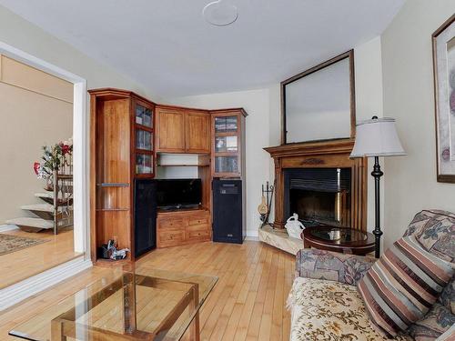 Salle familiale - 1883 Rue De Beaufort, Saint-Jérôme, QC - Indoor Photo Showing Living Room With Fireplace