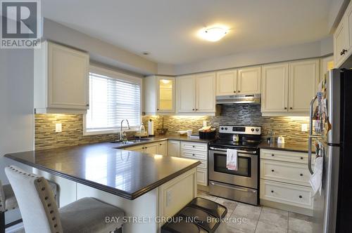 5 - 265 Ellen Davidson Drive, Oakville, ON - Indoor Photo Showing Kitchen With Stainless Steel Kitchen With Upgraded Kitchen