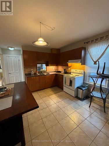 #2 - 79 Rosemount Avenue, Toronto, ON - Indoor Photo Showing Kitchen