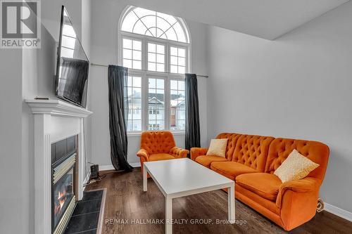 4 - 312 Wiffen, Ottawa, ON - Indoor Photo Showing Living Room With Fireplace