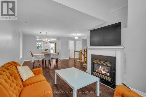 4 - 312 Wiffen, Ottawa, ON - Indoor Photo Showing Living Room With Fireplace