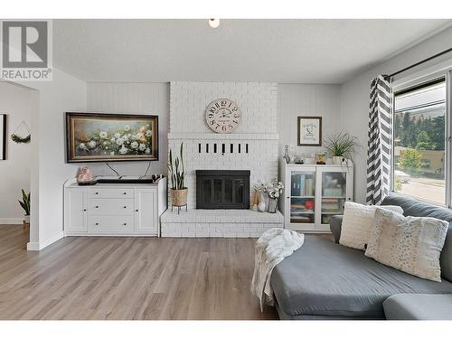 11029 Victoria Road S, Summerland, BC - Indoor Photo Showing Living Room With Fireplace