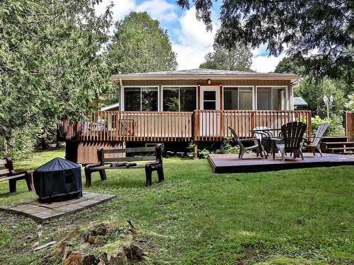 Back facade - 2120 Mtée Des Quatre-Lacs, Saint-Adolphe-D'Howard, QC - Outdoor With Deck Patio Veranda