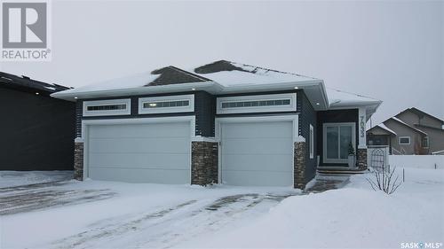 7033 Maple Fern Bay, Regina, SK - Outdoor With Facade