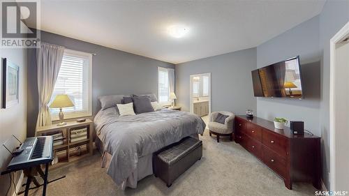 7033 Maple Fern Bay, Regina, SK - Indoor Photo Showing Bedroom