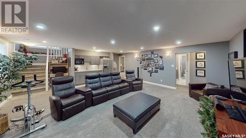 7033 Maple Fern Bay, Regina, SK - Indoor Photo Showing Living Room