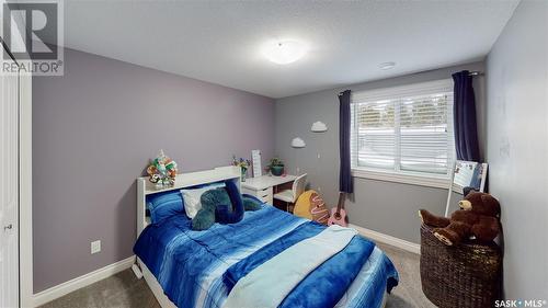 7033 Maple Fern Bay, Regina, SK - Indoor Photo Showing Bedroom