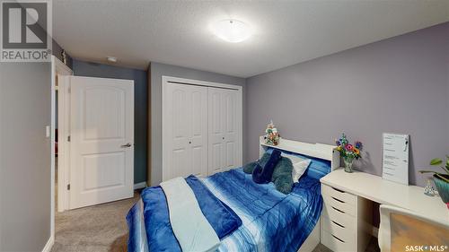 7033 Maple Fern Bay, Regina, SK - Indoor Photo Showing Bedroom