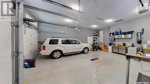 7033 Maple Fern Bay, Regina, SK - Indoor Photo Showing Garage