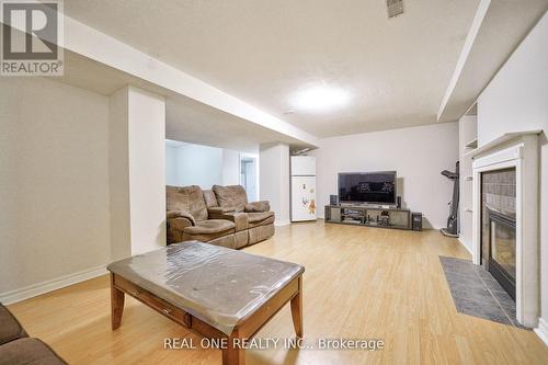 41 Timbercreek Court, Toronto, ON - Indoor Photo Showing Living Room With Fireplace