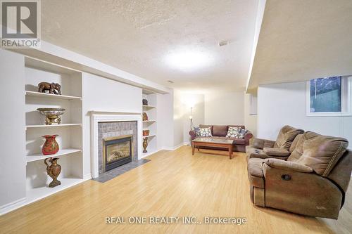 41 Timbercreek Court, Toronto, ON - Indoor Photo Showing Living Room With Fireplace